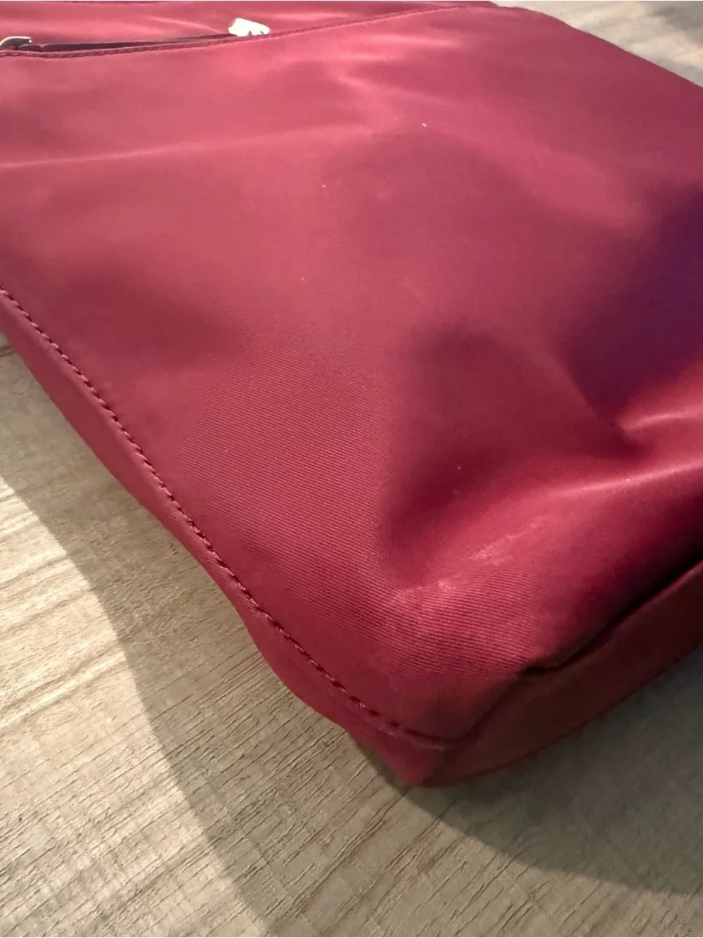 Kate Spade New York Burgundy Jae Flat Crossbody Bag